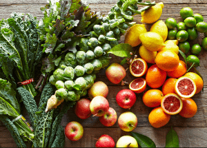 a group of fruits and vegetables on a wood surface Healthy Weight Loss Diets Sherborne